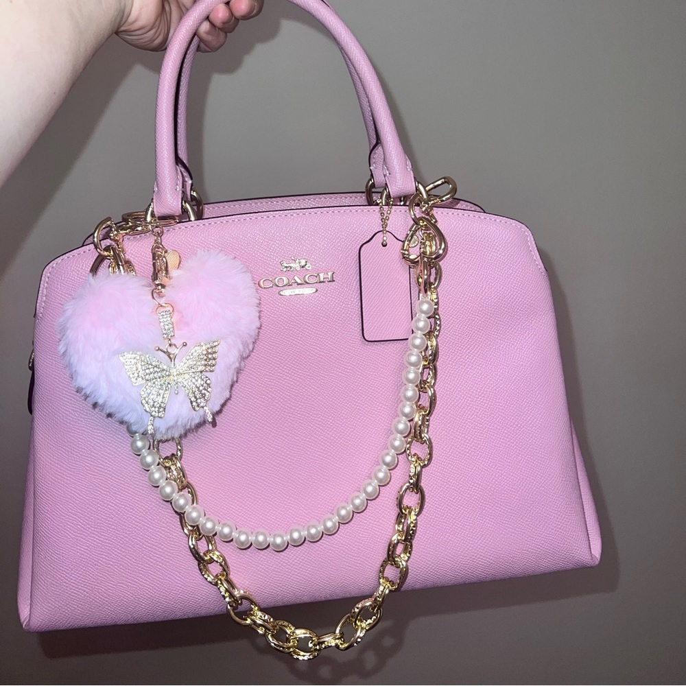 Coach Lillie carryall in pink with heart pom